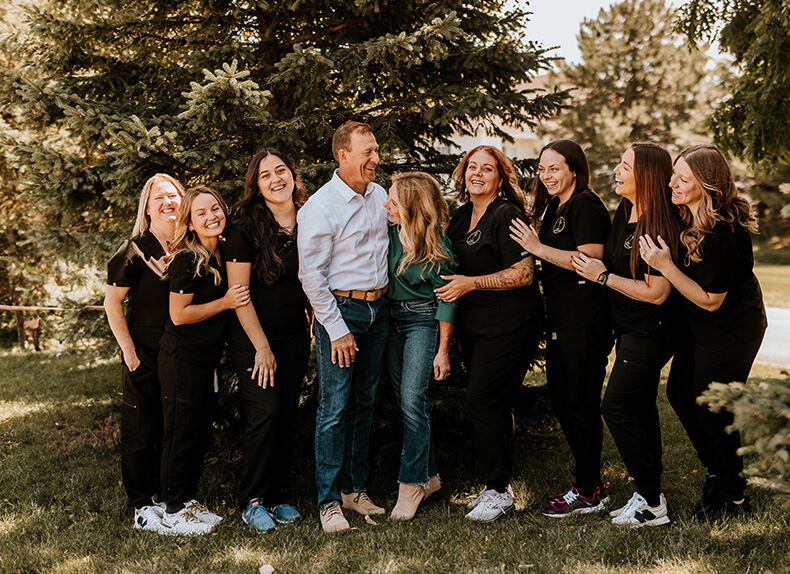 Rochester orthodontist and team members smiling